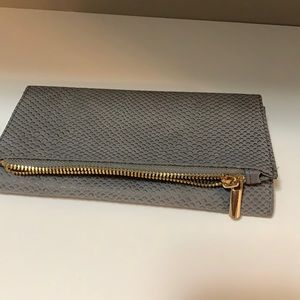 Textured leather wallet/clutch